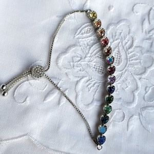 Pastel rainbow rhinestone heart tennis bracelet with bolo clasp silvertone